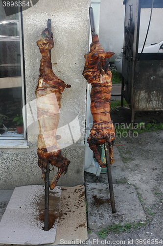 Image of Pigs baked on skewer