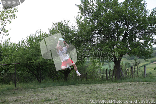 Image of Young man with frisbee