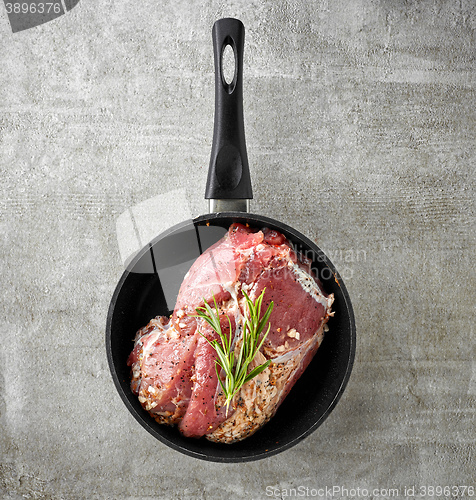 Image of Raw pork on cooking pan