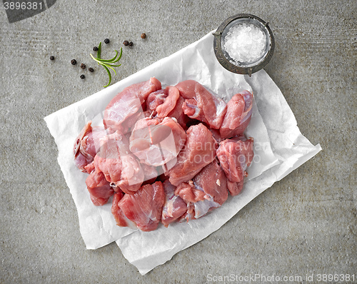 Image of heap of fresh raw meat cuts