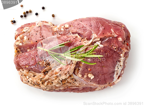 Image of raw marinated pork tenderloin