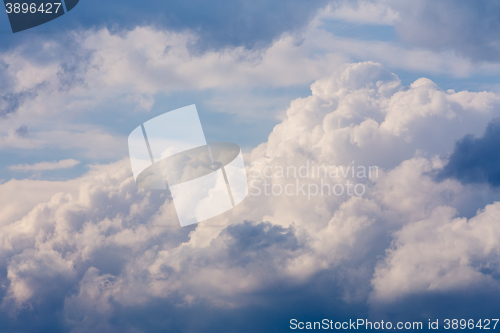 Image of White clouds on evening blue sky