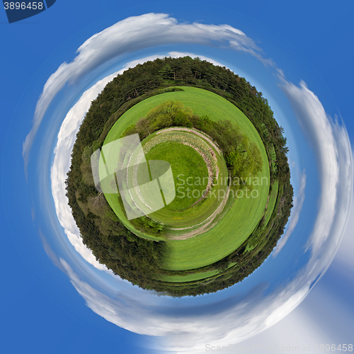 Image of tiniy planet Beautiful summer rural landscape