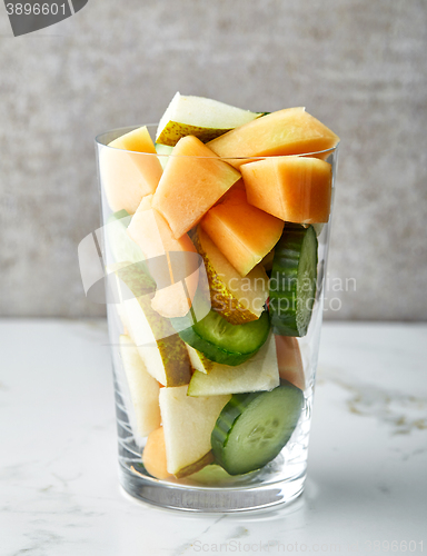 Image of glass of fruit and vegetable pieces