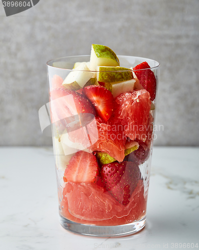 Image of glass of red smoothie ingredients