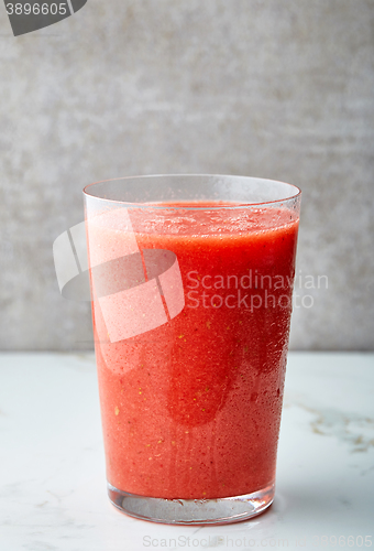 Image of glass of red smoothie