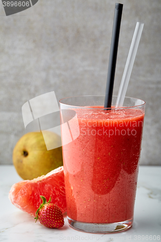Image of glass of red smoothie
