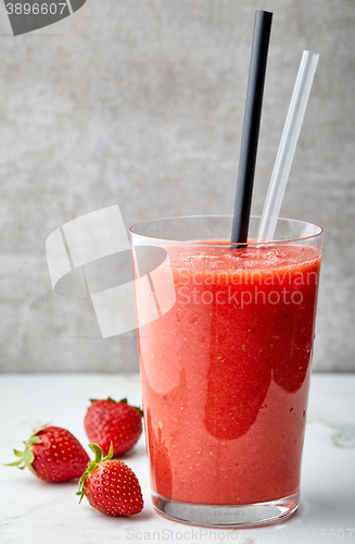 Image of glass of red smoothie