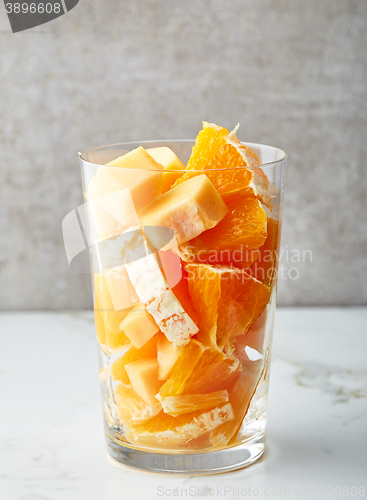 Image of glass of fruit pieces for making smoothie