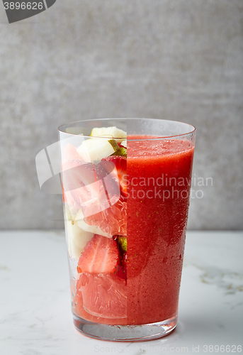 Image of glass of red smoothie