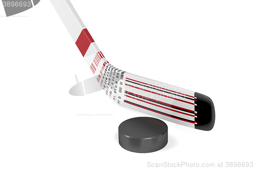 Image of Ice hockey stick and puck 