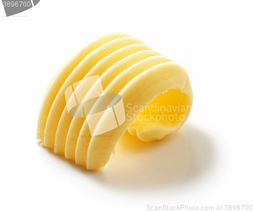 Image of butter curl on white background