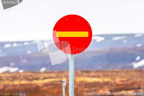 Image of Stop sign in highland landscape