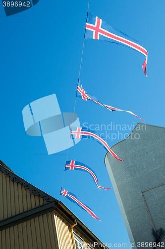 Image of Iceland flags hanging on a wire