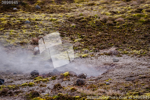 Image of Steamy smoke on a lava field