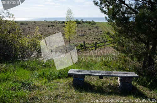 Image of Wooden bench at a view point