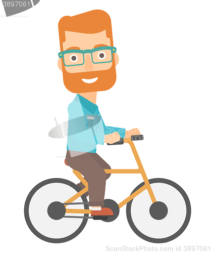 Image of Man cycling to work.