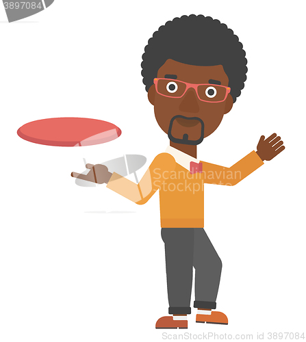 Image of Man playing flying disc.