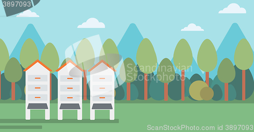 Image of Background of beehives in meadow.