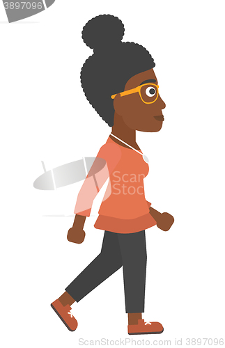 Image of Business woman walking