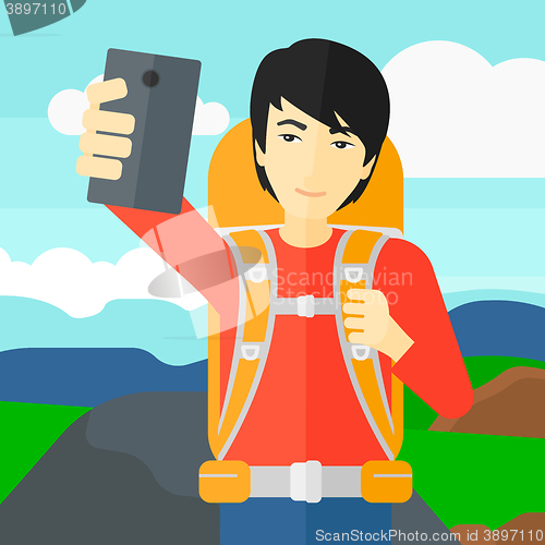 Image of Backpckaer making selfie.
