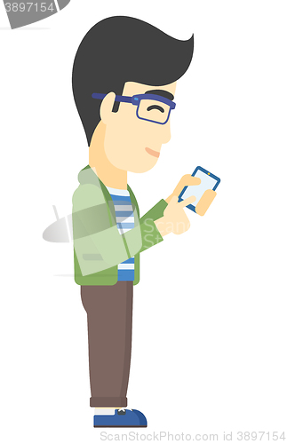 Image of Man using mobile phone