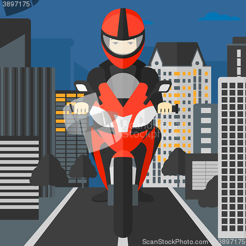 Image of Man riding motorcycle.