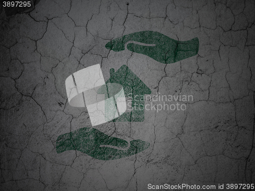 Image of Insurance concept: House And Palm on grunge wall background