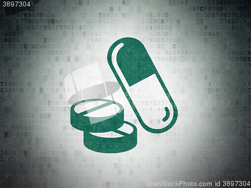 Image of Health concept: Pills on Digital Data Paper background