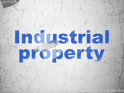 Image of Law concept: Industrial Property on wall background