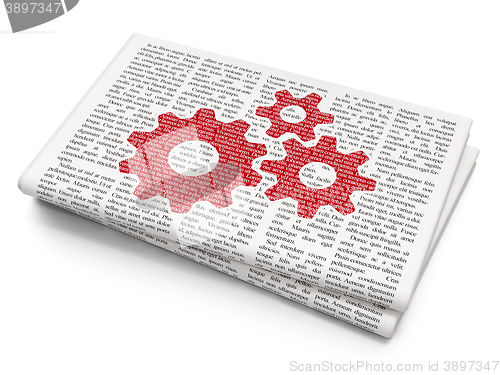 Image of Advertising concept: Gears on Newspaper background