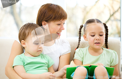 Image of Family is reading book