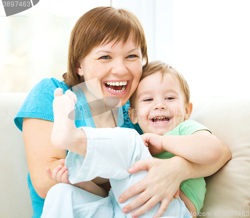 Image of Mother and her son is having fun