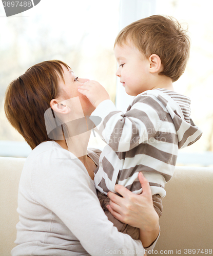 Image of Mother holding her son