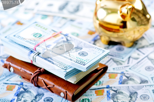 Image of Piggy bank and money