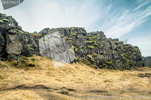 Image of Landscape with green moss on cliffs