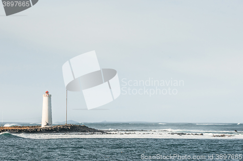 Image of Island with a small lighthouse