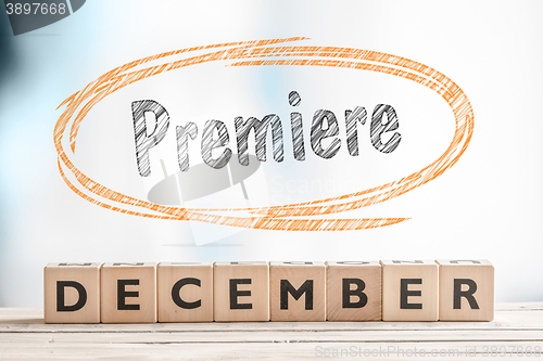 Image of December premiere sign on a stage