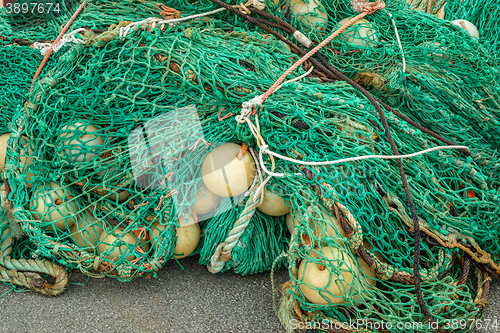 Image of Fishing equipment by a harbor