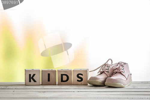 Image of Kids sign and cute shoes