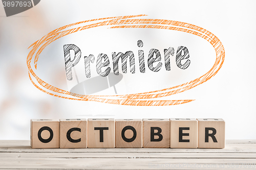 Image of October premiere sign made of wood
