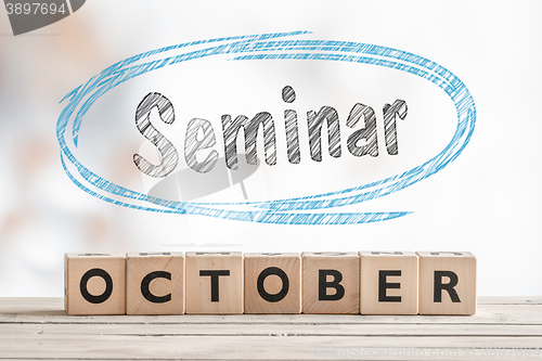 Image of October seminar sign made of wood