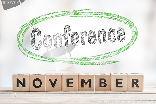 Image of November conference sign with wooden blocks