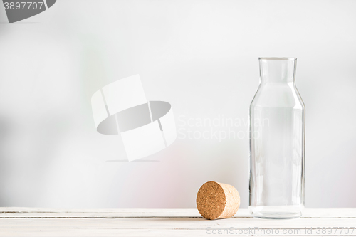 Image of Glass bottle with a brown cork