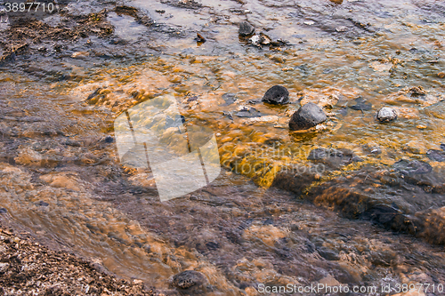 Image of Water stream on a lava field