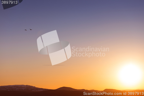 Image of White clouds over blue sky with birds