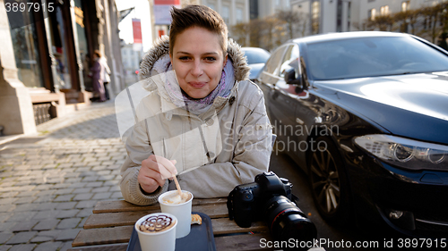 Image of Cute girl drinking coffee