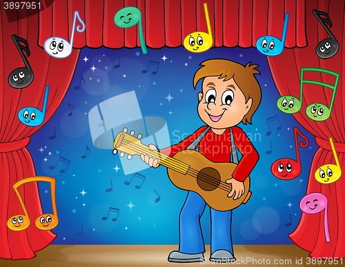 Image of Boy guitar player on stage theme 2