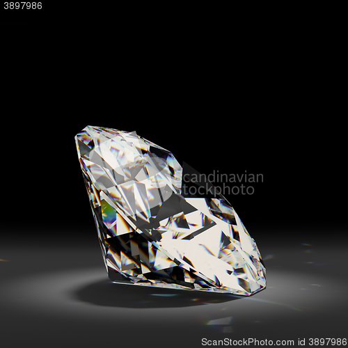 Image of Shiny white diamond on black background. 