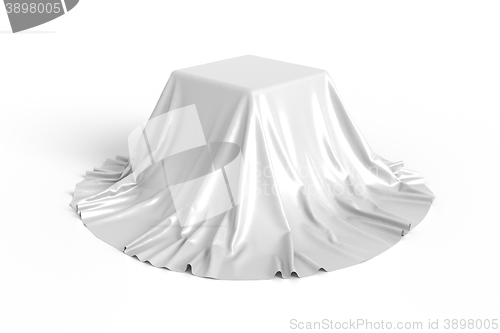 Image of Box covered with white fabric.